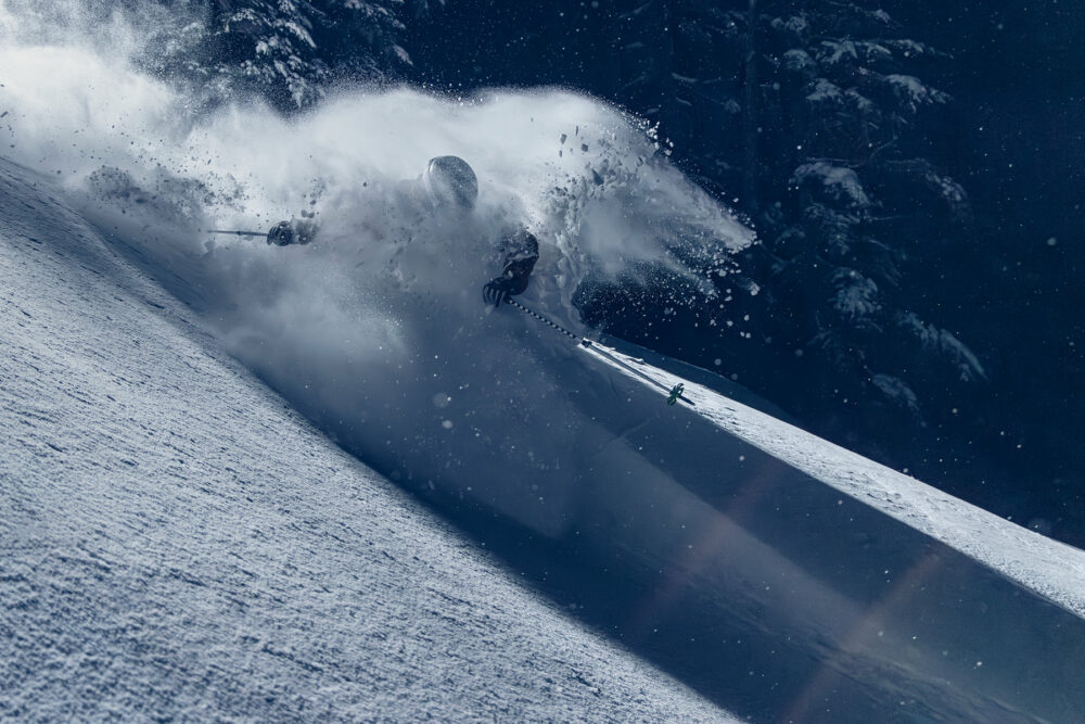 Athlete skiing in the dark